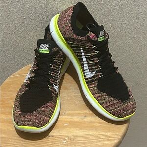 Nike Free Run Flyknit Unlimited Olympic 843430-999. Multi-Color/Black-White-Volt